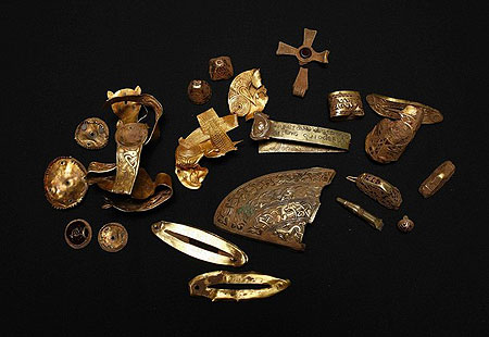 A hoard of Anglo-Saxon treasure named 'The Staffordshire Hoard' is seen at the Birmingham Museum and Art Gallery during a news conference in Birmingham, central England September 24, 2009. Britain's largest haul of Anglo-Saxon treasure was discovered buried in a Staffordshire field, and according to experts the collection of 1,500 gold and silver pieces, which could date back to the 7th Century, was of unparalleled size, local media reported.